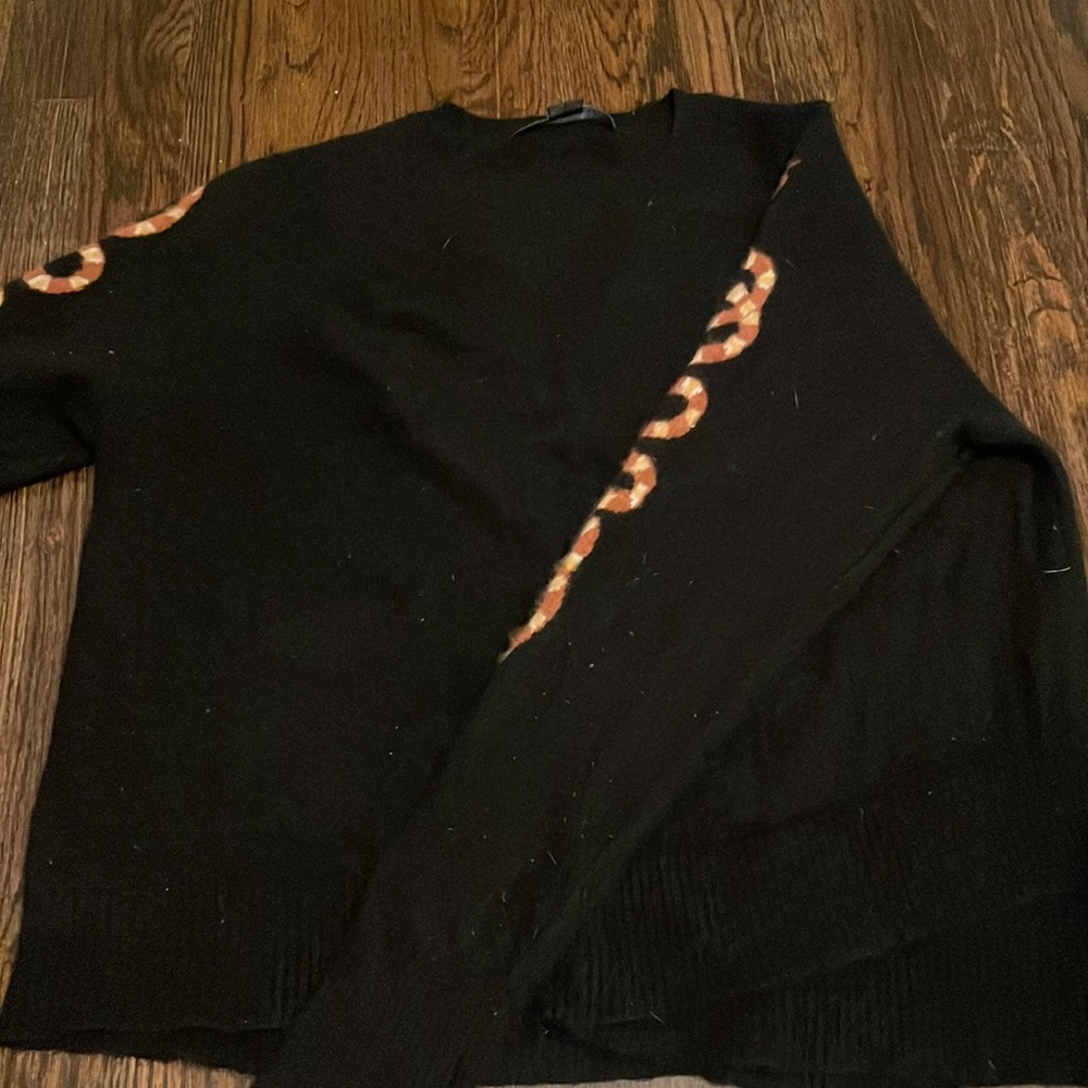 Skoal cashmere black sweater with snake detailing